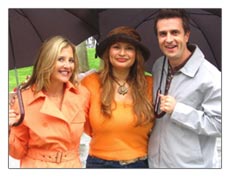 Shirley and. hosts Christine Blackburn and Dan Sachoff get caught in the rain in Venice, California. Shirley and. hosts Christine Blackburn and Dan Sachoff get caught in the rain in Venice, California.